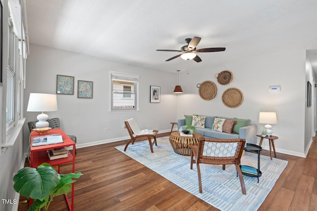 2322 Stroller Ave, Durham, NC 27705 - living room with ceiling fan and wood finished floors