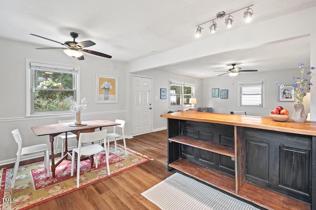 2322 Stroller Ave, Durham, NC 27705 - dining area featuring ceiling fan and dark wood-style flooring