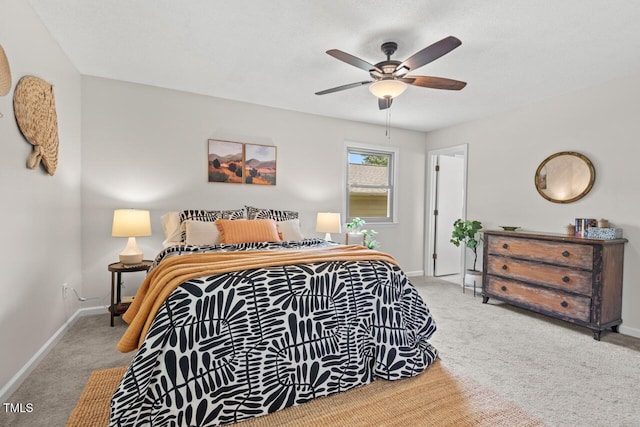 2322 Stroller Ave, Durham, NC 27705 - carpeted bedroom with baseboards and ceiling fan