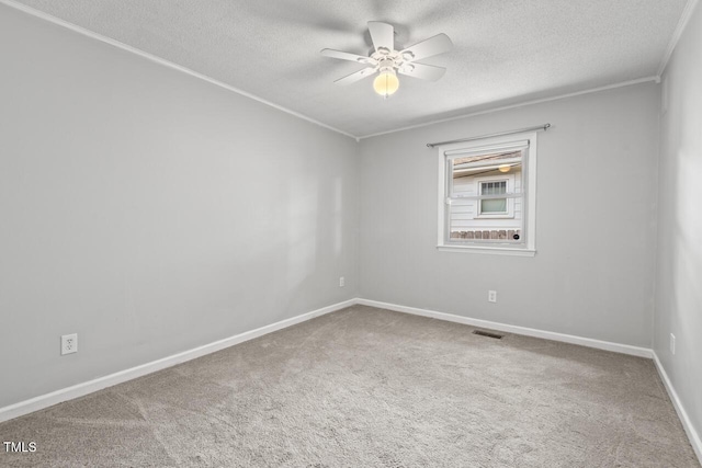 2322 Stroller Ave, Durham, NC 27705 - carpeted spare room featuring a textured ceiling, a ceiling fan, and crown molding
