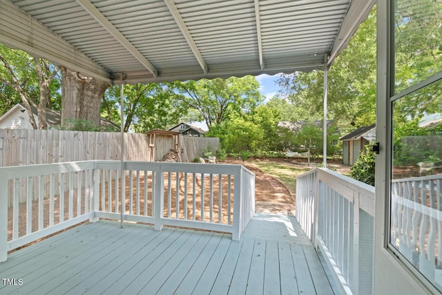 2322 Stroller Ave, Durham, NC 27705 - deck featuring a fenced backyard and a storage shed