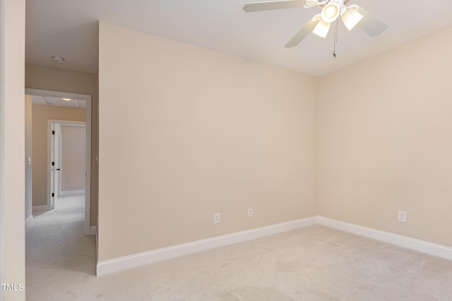 1304 Barnford Mill Rd, Wake Forest, NC 27587 - unfurnished room featuring light colored carpet, a ceiling fan, and a smoke detector