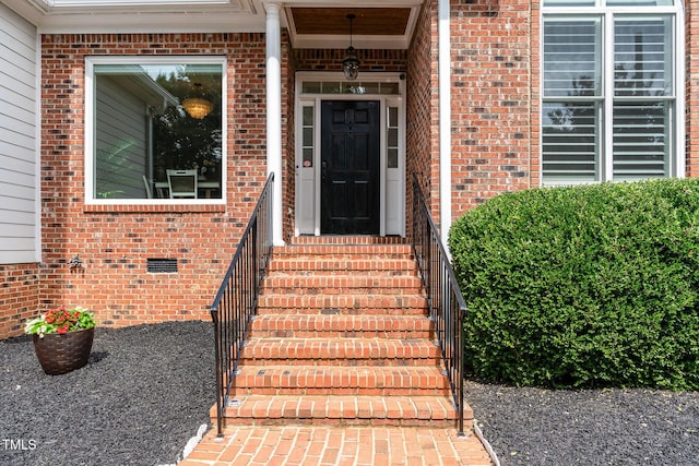6313 Belle Crest Dr, Raleigh, NC 27612 - view of exterior entry with brick siding