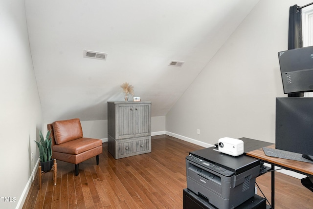 6313 Belle Crest Dr, Raleigh, NC 27612 - home office featuring wood finished floors and vaulted ceiling