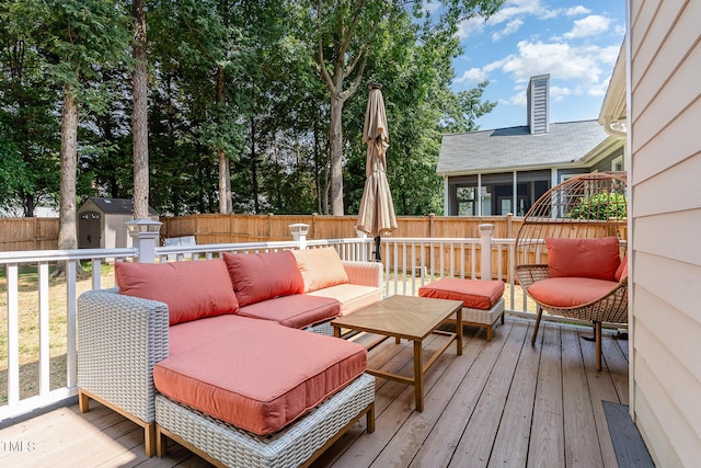6313 Belle Crest Dr, Raleigh, NC 27612 - deck with a fenced backyard, a storage shed, an outdoor hangout area, and a sunroom