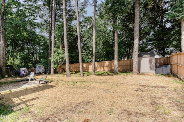 6313 Belle Crest Dr, Raleigh, NC 27612 - fenced backyard featuring a shed