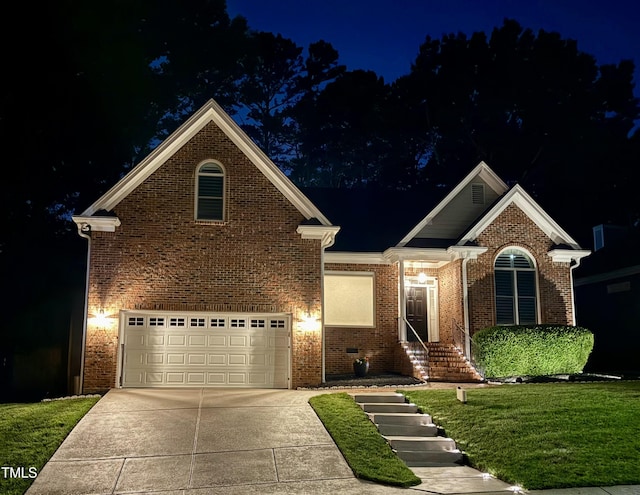 6313 Belle Crest Dr, Raleigh, NC 27612 - view of front of house with a garage, driveway, brick siding, and a lawn
