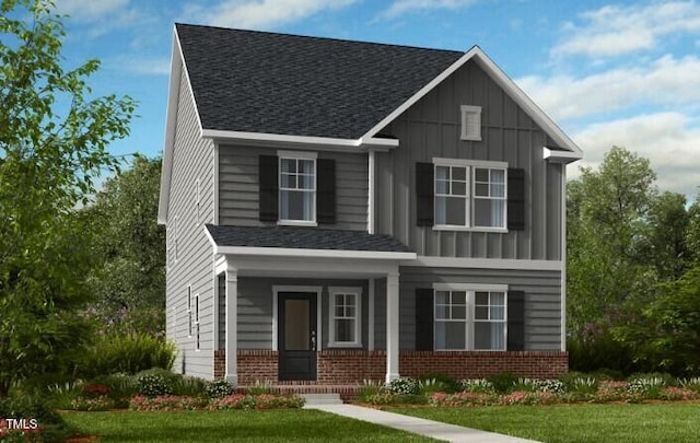 1061 Hardin Hill Ln, Knightdale, NC 27545 - craftsman house with brick siding, board and batten siding, a front lawn, and a shingled roof