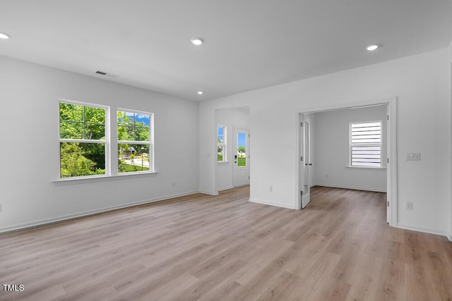 1061 Hardin Hill Ln, Knightdale, NC 27545 - spare room featuring light wood-type flooring and recessed lighting