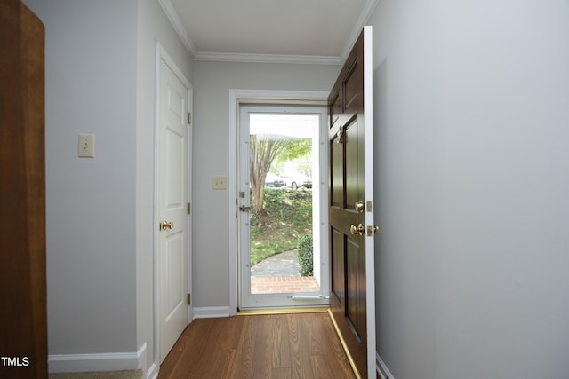 146 Greenmont Ln, Cary, NC 27511 - entryway featuring crown molding and dark wood finished floors