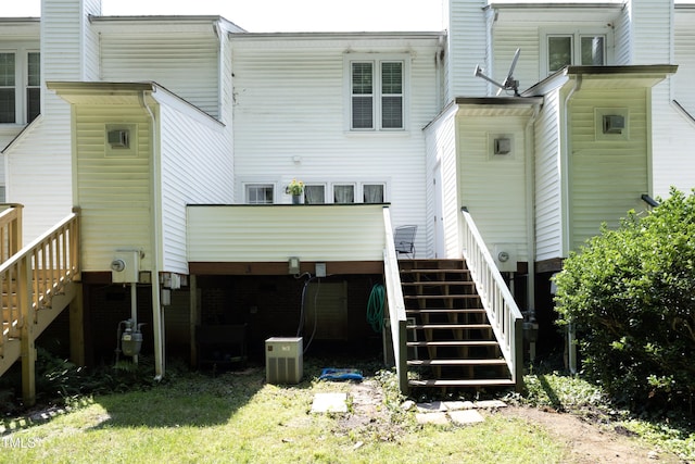 146 Greenmont Ln, Cary, NC 27511 - rear view of house featuring stairway and a wooden deck