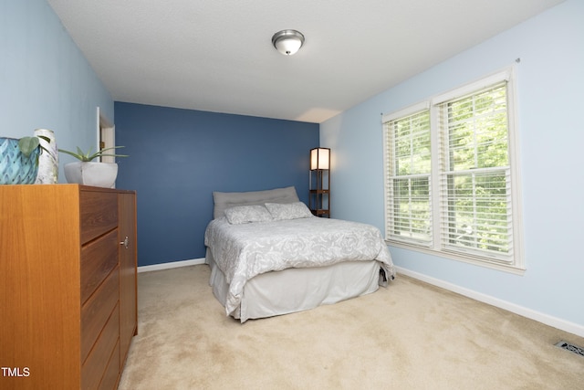 146 Greenmont Ln, Cary, NC 27511 - bedroom with light colored carpet and baseboards