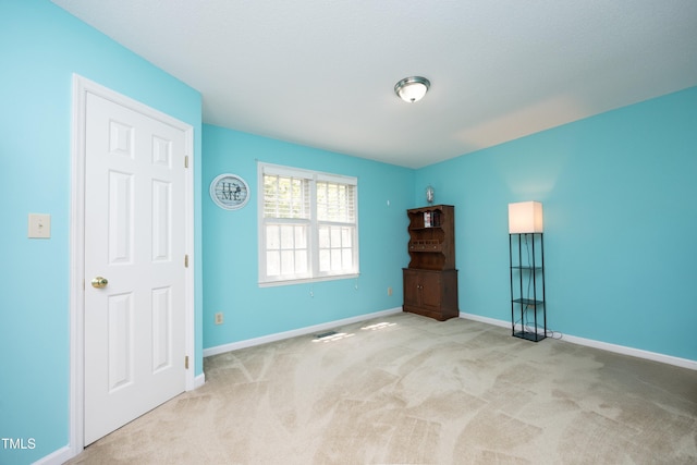 146 Greenmont Ln, Cary, NC 27511 - unfurnished bedroom featuring carpet floors and baseboards