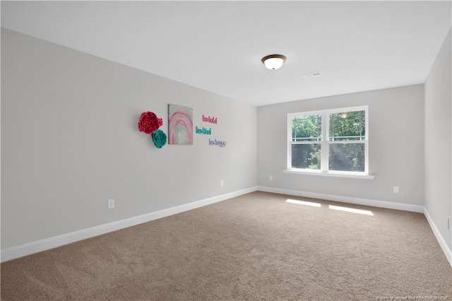 66 S Hawks Ridge Ln, Smithfield, NC 27577 - carpeted empty room featuring baseboards