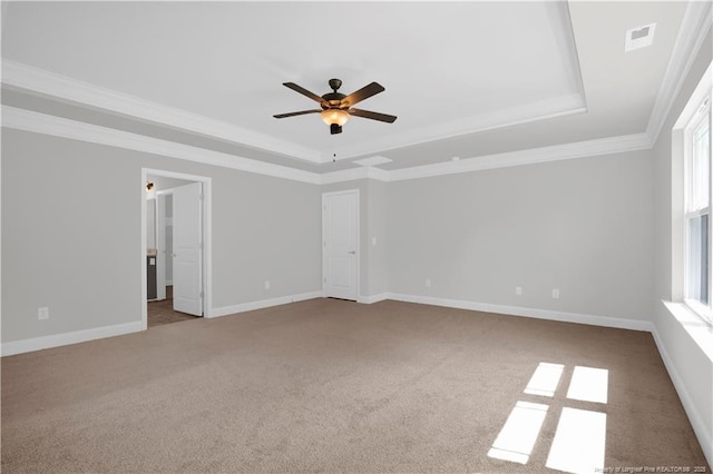 66 S Hawks Ridge Ln, Smithfield, NC 27577 - unfurnished room featuring a raised ceiling, ceiling fan, carpet floors, ornamental molding, and baseboards