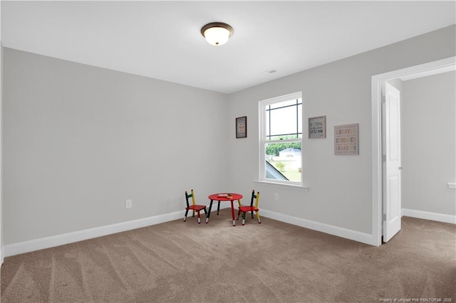 66 S Hawks Ridge Ln, Smithfield, NC 27577 - rec room with carpet floors and baseboards