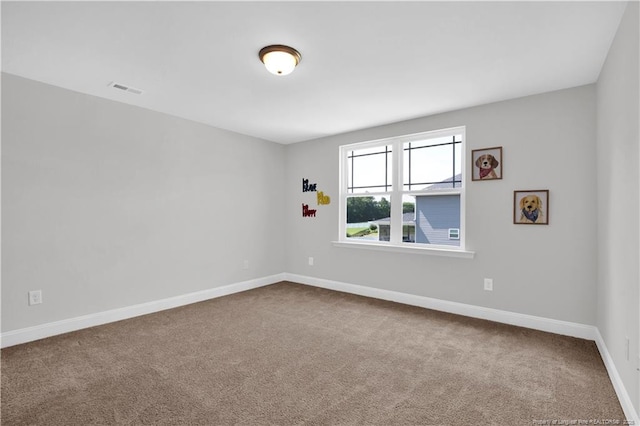 66 S Hawks Ridge Ln, Smithfield, NC 27577 - spare room featuring carpet and baseboards