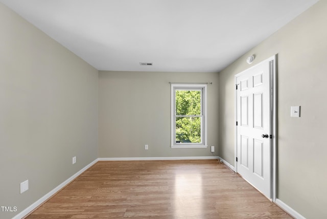 3427 Mill Run, Raleigh, NC 27612 - spare room with light wood-type flooring and baseboards