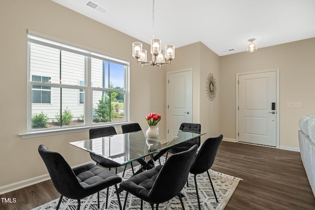364 Abbots Mill Dr, Raleigh, NC 27603 - dining space with a chandelier, healthy amount of natural light, and dark wood-type flooring