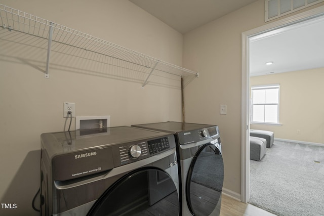 364 Abbots Mill Dr, Raleigh, NC 27603 - washroom featuring washing machine and dryer and carpet flooring
