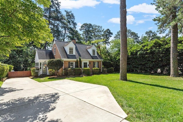 1100 Brooks Ave, Raleigh, NC 27607 - cape cod-style house with a chimney and brick siding