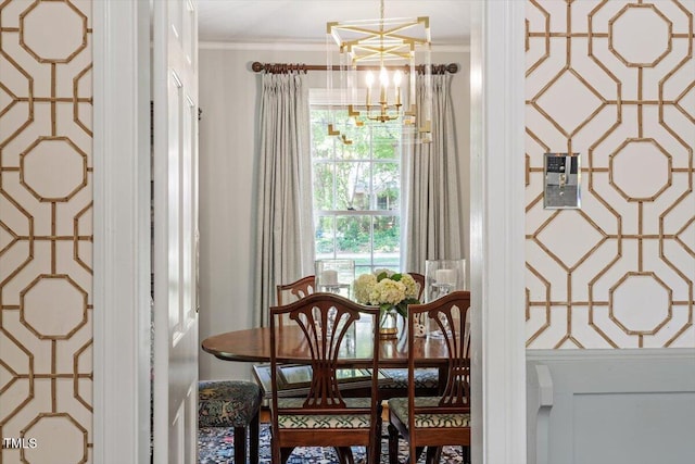 1100 Brooks Ave, Raleigh, NC 27607 - dining room with a chandelier and crown molding