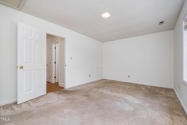 2213 Alpine Rd, Durham, NC 27707 - spare room featuring carpet floors and baseboards