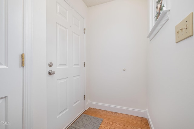 2213 Alpine Rd, Durham, NC 27707 - doorway to outside featuring baseboards and light wood finished floors