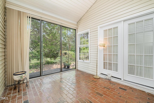 384 Lyndfield Cl W, Pittsboro, NC 27312 - unfurnished sunroom with vaulted ceiling, healthy amount of natural light, and french doors