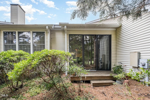 384 Lyndfield Cl W, Pittsboro, NC 27312 - doorway to property with a wooden deck