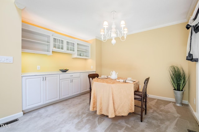384 Lyndfield Cl W, Pittsboro, NC 27312 - dining room featuring a chandelier, light colored carpet, and crown molding