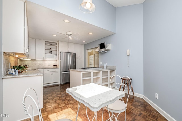384 Lyndfield Cl W, Pittsboro, NC 27312 - dining room with a ceiling fan and recessed lighting