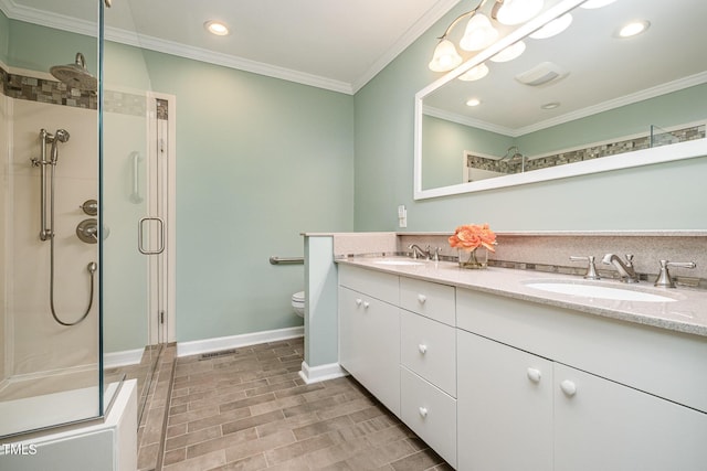 384 Lyndfield Cl W, Pittsboro, NC 27312 - full bathroom featuring a shower stall, double vanity, crown molding, and recessed lighting