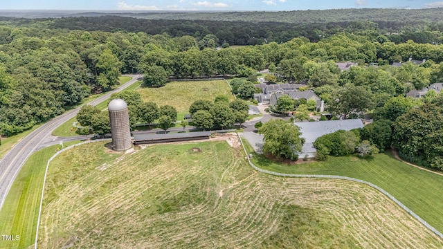 384 Lyndfield Cl W, Pittsboro, NC 27312 - aerial view of property and surrounding area with a heavily wooded area
