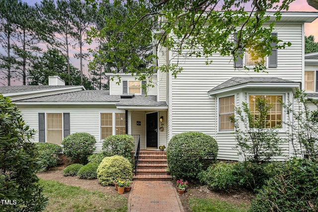 384 Lyndfield Cl W, Pittsboro, NC 27312 - view of front facade with a shingled roof