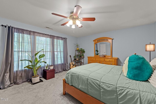 15 Smoketree Ct, Durham, NC 27712 - carpeted bedroom featuring a ceiling fan