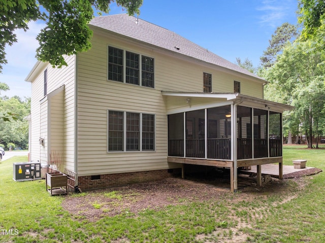 15 Smoketree Ct, Durham, NC 27712 - rear view of property featuring a lawn, a sunroom, a shingled roof, and crawl space