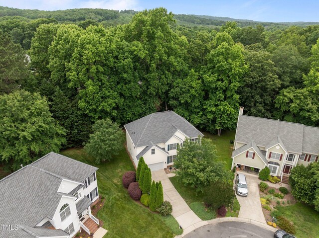 15 Smoketree Ct, Durham, NC 27712 - view of subject property with a heavily wooded area