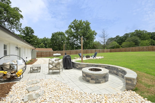 2320 Marks Creek Rd, Knightdale, NC 27545 - fenced backyard with an outdoor fire pit, a patio, view of wooded area, and area for grilling