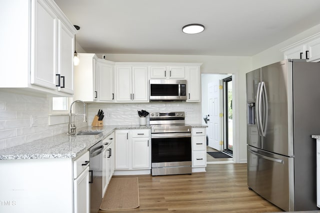 2320 Marks Creek Rd, Knightdale, NC 27545 - kitchen featuring appliances with stainless steel finishes and white cabinets