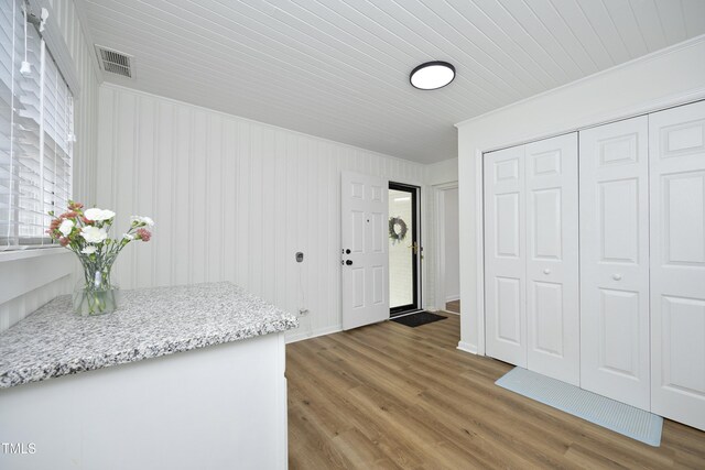 2320 Marks Creek Rd, Knightdale, NC 27545 - entryway featuring wood finished floors and ornamental molding