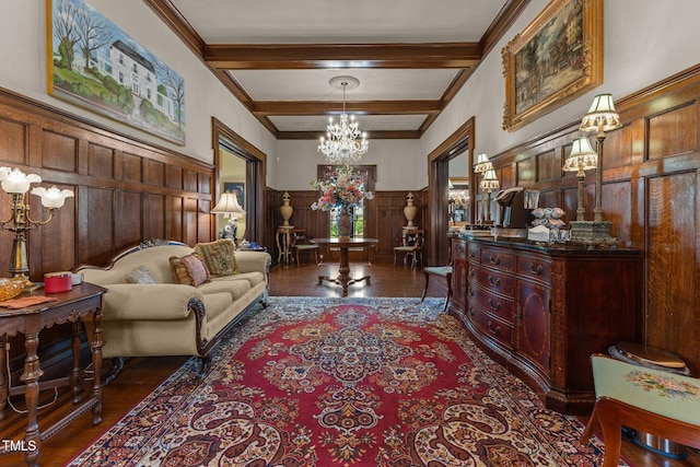 309 W Divine St, Dunn, NC 28334 - living room with a chandelier, a wainscoted wall, dark wood-style flooring, beamed ceiling, and ornamental molding