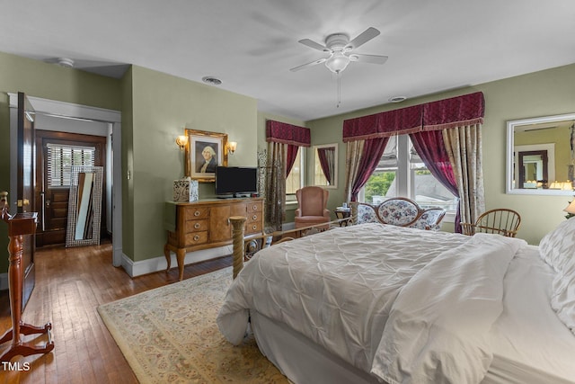 309 W Divine St, Dunn, NC 28334 - bedroom featuring hardwood / wood-style flooring and baseboards