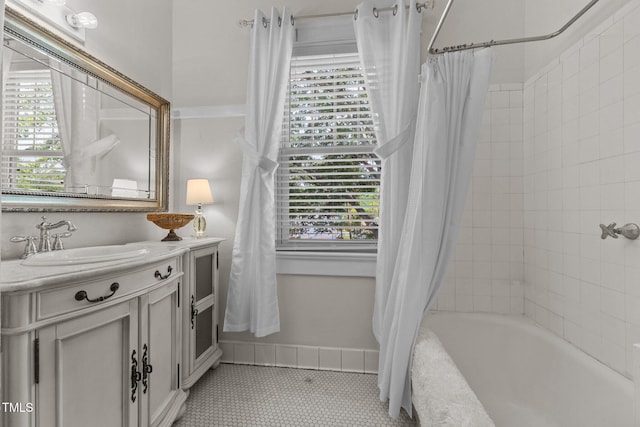 309 W Divine St, Dunn, NC 28334 - bathroom with shower / tub combo with curtain and vanity