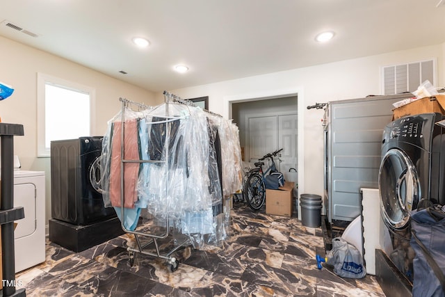 309 W Divine St, Dunn, NC 28334 - laundry room featuring marble tiled floors, recessed lighting, and separate washer and dryer