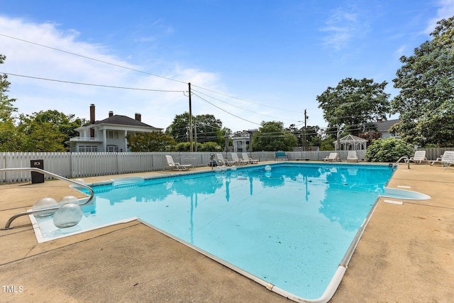 309 W Divine St, Dunn, NC 28334 - view of swimming pool featuring a patio