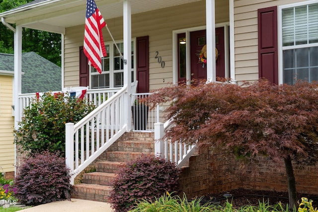 200 Holly Branch Dr, Holly Springs, NC 27540 - view of exterior entry with a porch