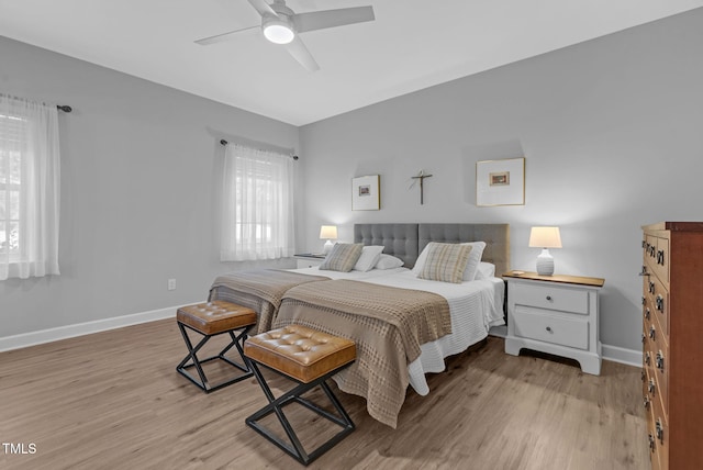 200 Holly Branch Dr, Holly Springs, NC 27540 - bedroom featuring light wood-style floors and a ceiling fan