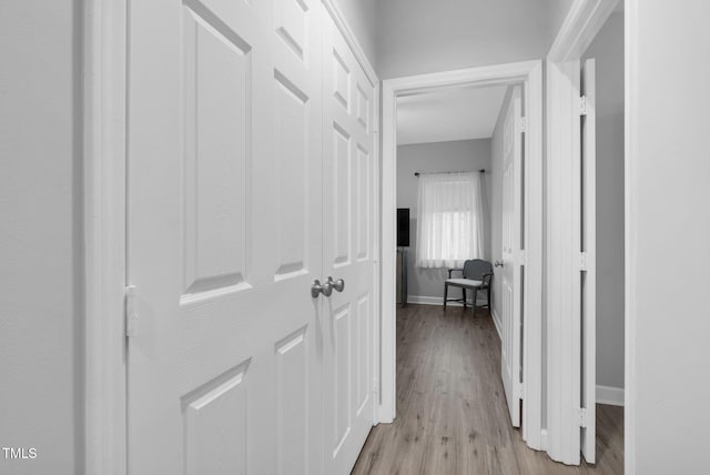 200 Holly Branch Dr, Holly Springs, NC 27540 - hall featuring light wood-type flooring and baseboards