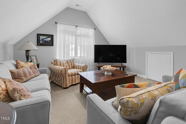 200 Holly Branch Dr, Holly Springs, NC 27540 - living room with light colored carpet and lofted ceiling